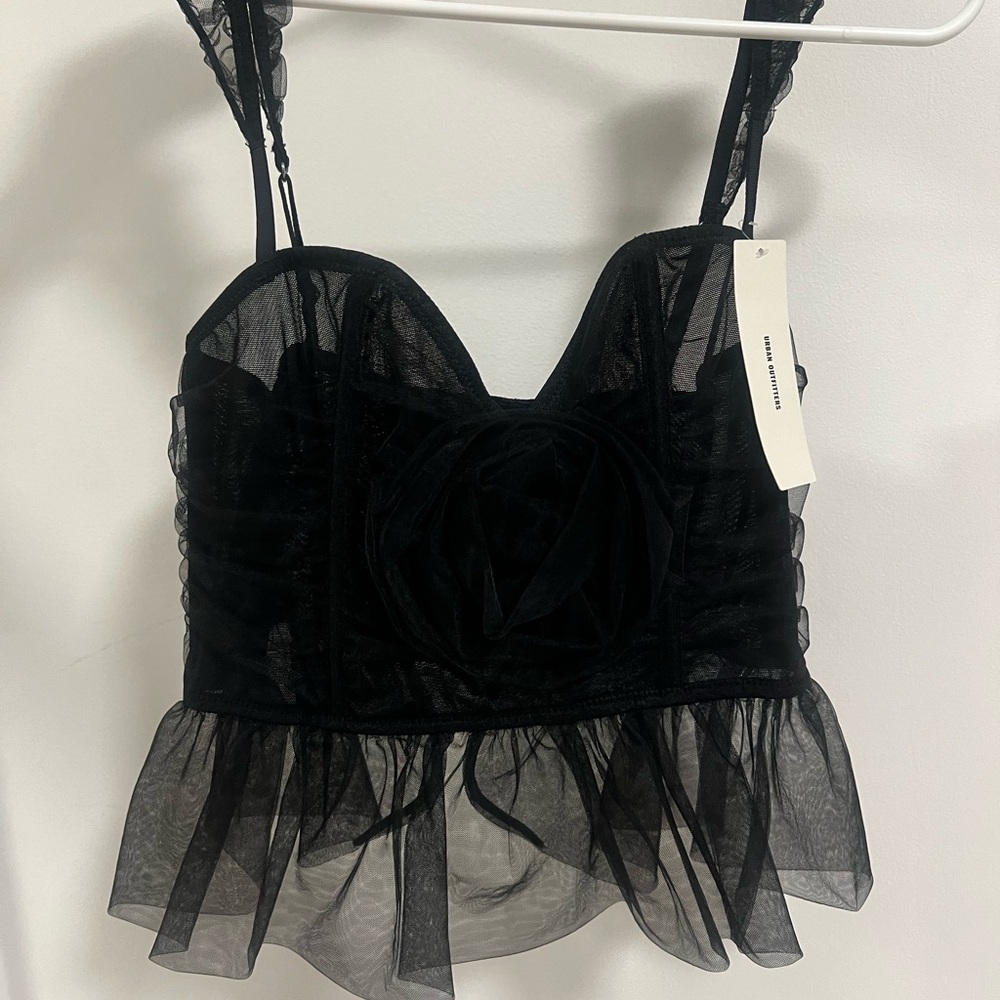 Urban Outfitters corset top has a rose in the center
